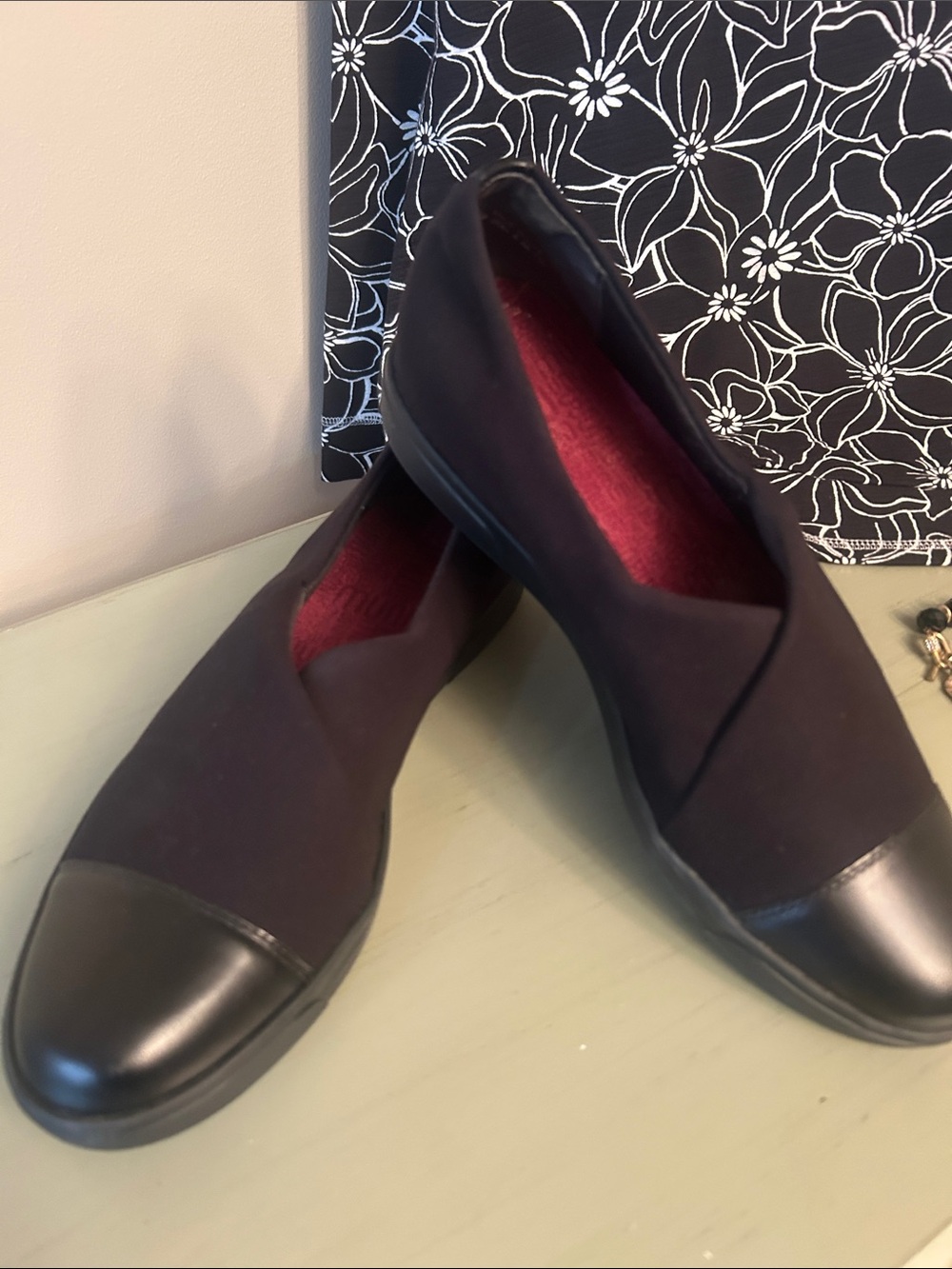 Munro Women's Dark Black Slip-On Flats with Black Cap Toe